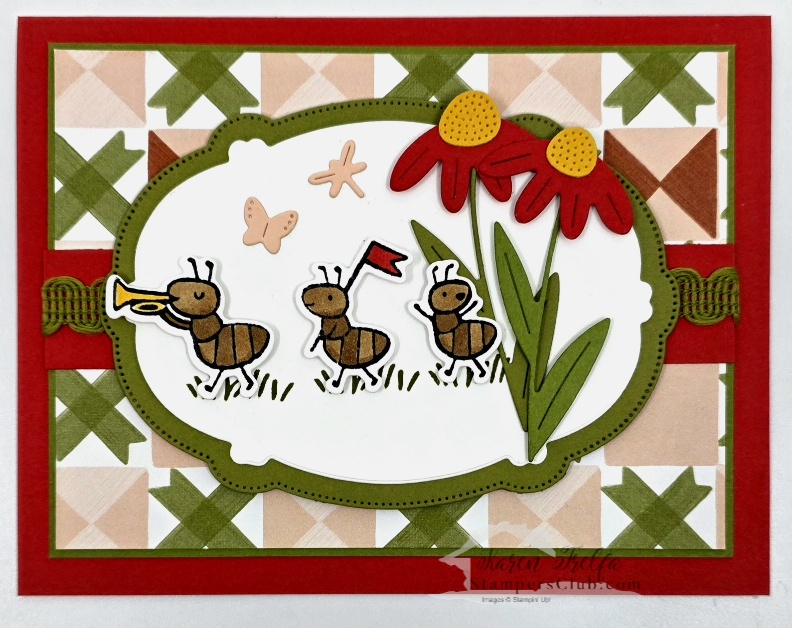 Sweet Bugs Stampin' Up card featuring three marching ants inside an oval die-cut frame with a large red coneflower die cut and quilted diamond pattern designer paper on a red card base