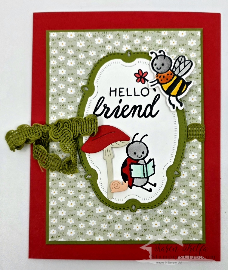 Sweet Bugs Stampin' Up Hello Friend card with a bee and a ladybug reading under a red mushroom die cut, daisy print designer paper, olive green oval frame, and green fringe ribbon bow on a red card base